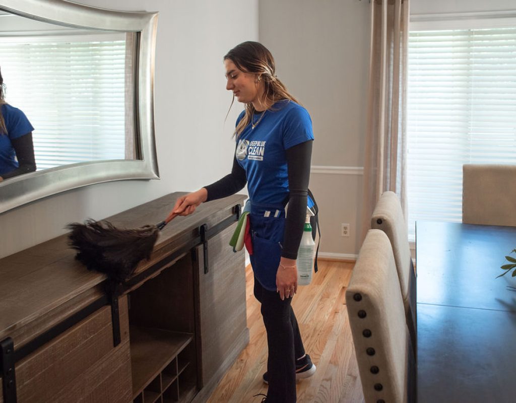 DSC_0533 Housekeeper vacuuming a carpet in a Louisville, KY home